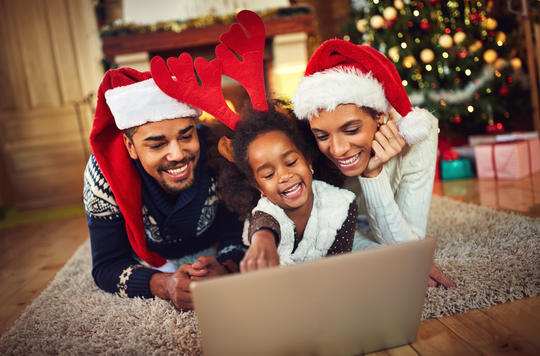 Family at christmas on laptop