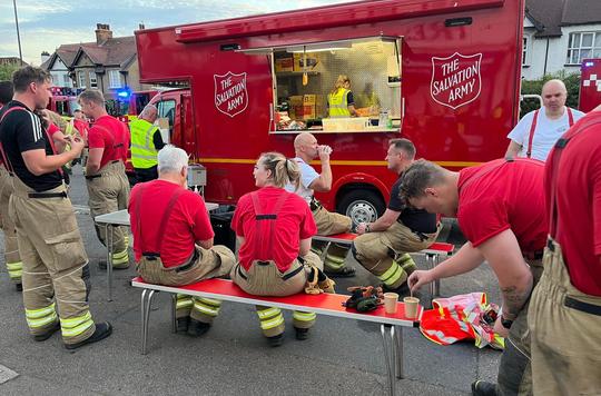 The Salvation Army Incident Response vehicle provides refreshments to Firefighters..