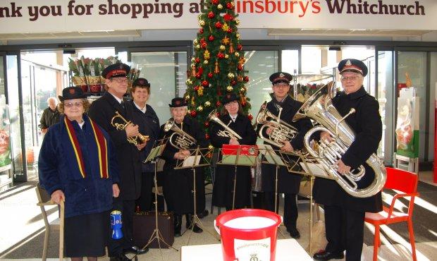 The Rhosllanerchrugog band Christmas carolling at Sainsbury's Whitchurch