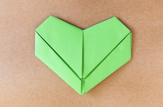 A green heart made of paper