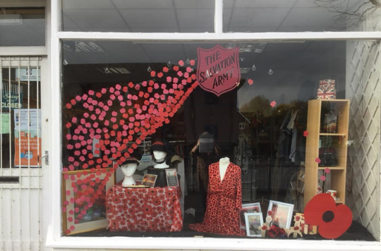 Remembrance Day window dressing at Chorley SA Charity Shop