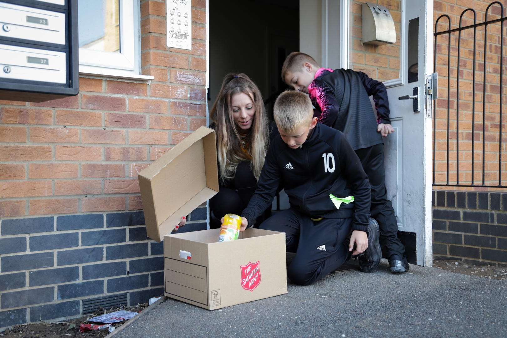 A family receiving a food parcel 