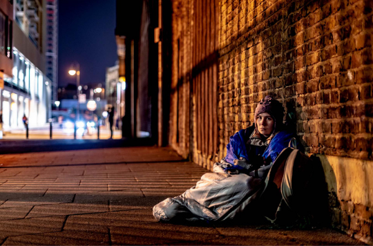 A person sleeping rough on the streets