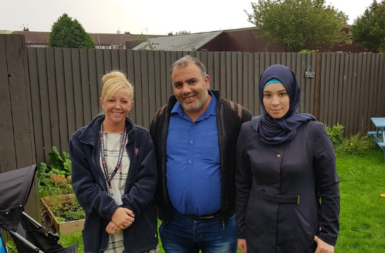 Ayat and her husband Bassem with support worker Alex Foden 