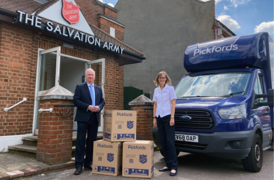 Steve Wilkins of Pickfords with Hilarie Watchorn of The Salvation Army 