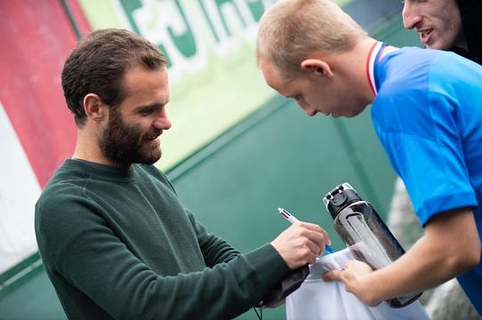 Juan Mata at Partnership Trophy signing autographs