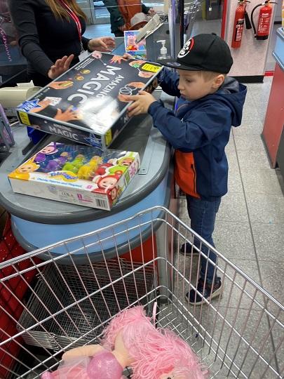 Finley buying toys 2021