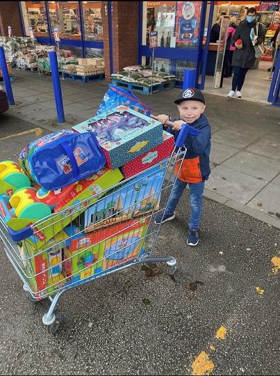 Finley with toys trolley