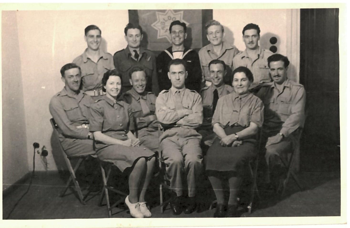Middle East Red Shield Staff and Helpers featuring Olive Cooksley (far right).