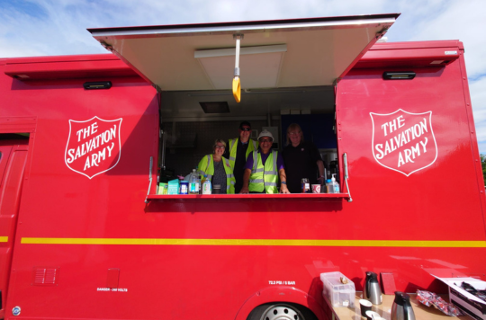 DIY SOS team in the red van of the Salvation army