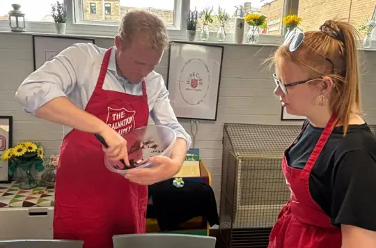 Picture of Robbie Moore MP baking