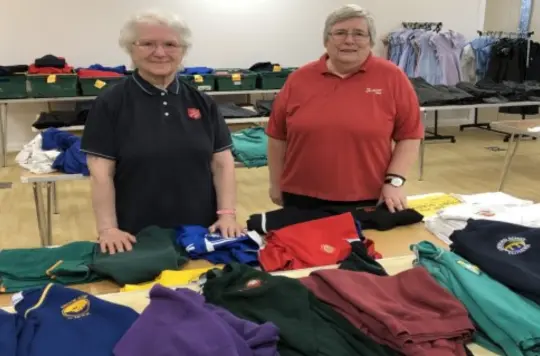 A picture of people in a Uniform Exchange