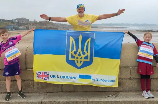 People with a Ukrainian flag 