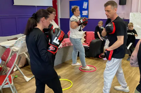 a picture of people doing boxing exercises