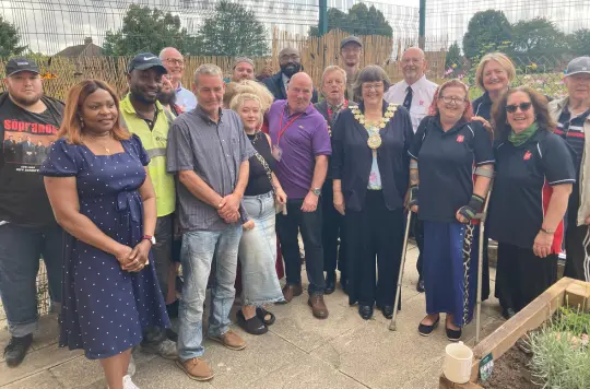 A group of people standing together 