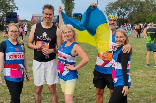 People in Salvation Army running tops at Great North Run 