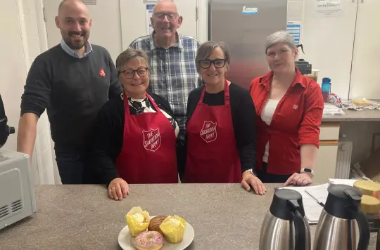 A picture of a group of people smiling at the camera 