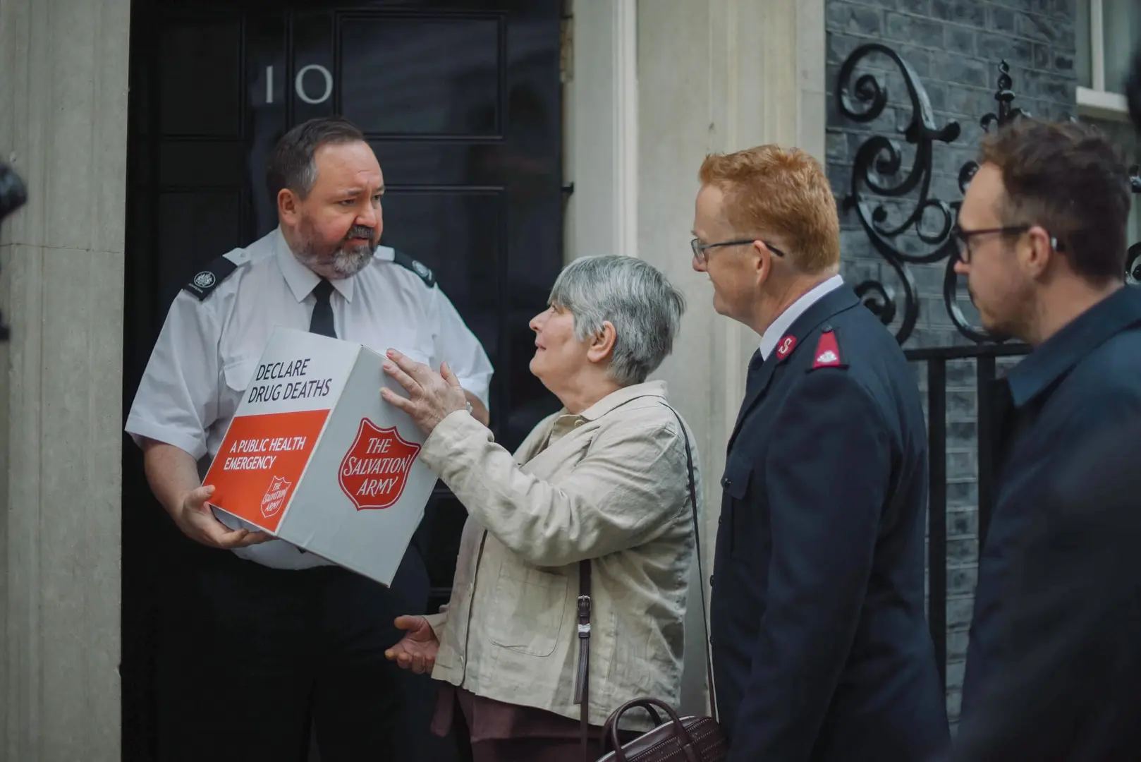 Liz hands in The Salvation Army's petition to 10 Downing Street