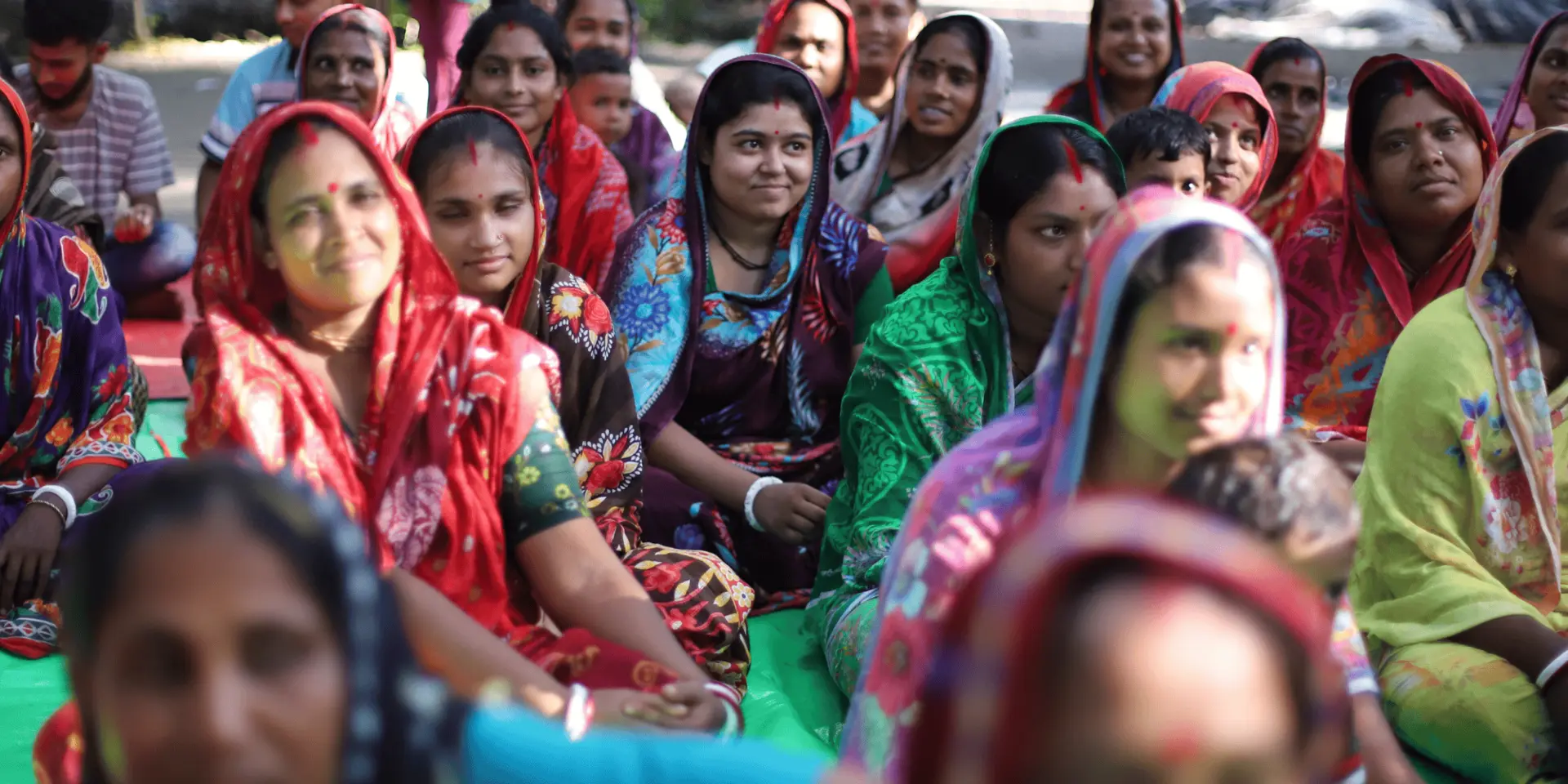 Group of Bangladeshi women sitting on the floor