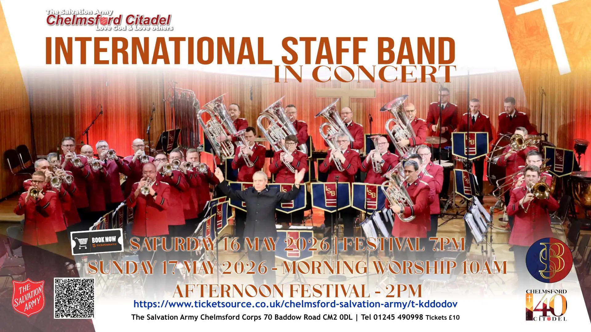 Wide group photo of The Salvation Army International Staff Band performing in concert, wearing red uniforms and playing brass instruments on a stage. Promotional text advertises an ‘International Staff Band in Concert’ at Chelmsford Citadel, with dates and times for festival performances and worship services.