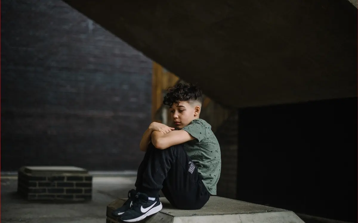 Tommy sat on his own feeling lonely