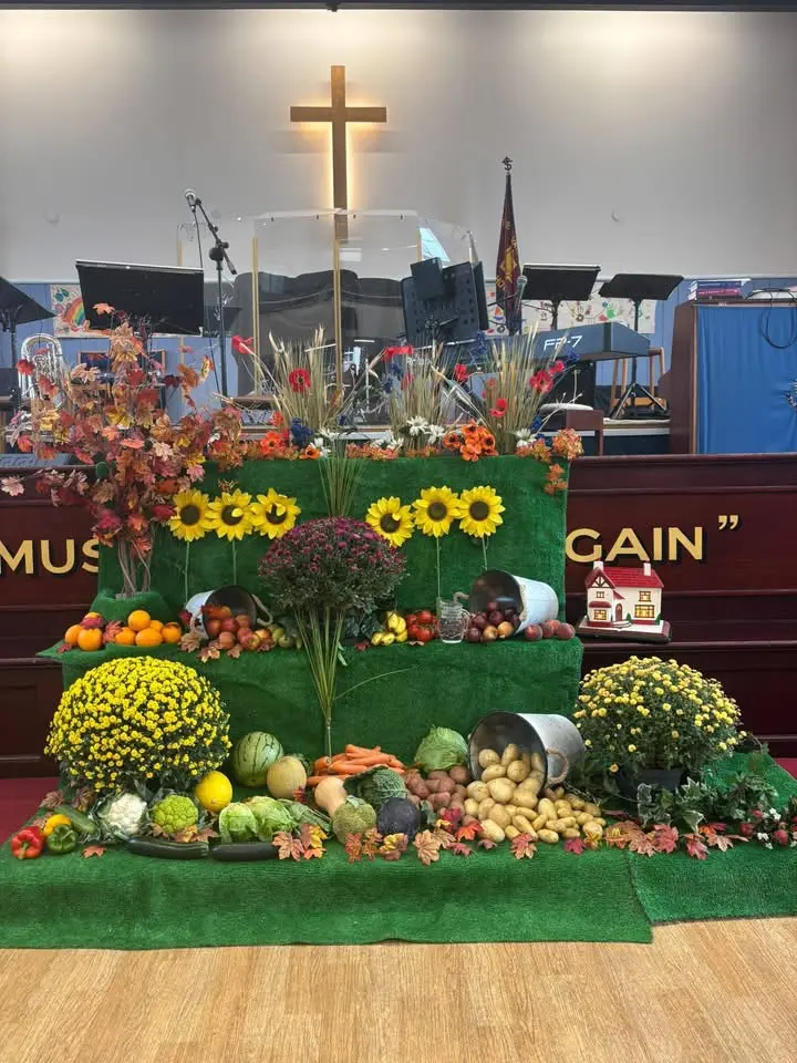 Display of fruit and vegetables at the mercy seat in Hove Salvation Army hall celebrating Harvest