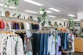 Clothes on rails in a shop
